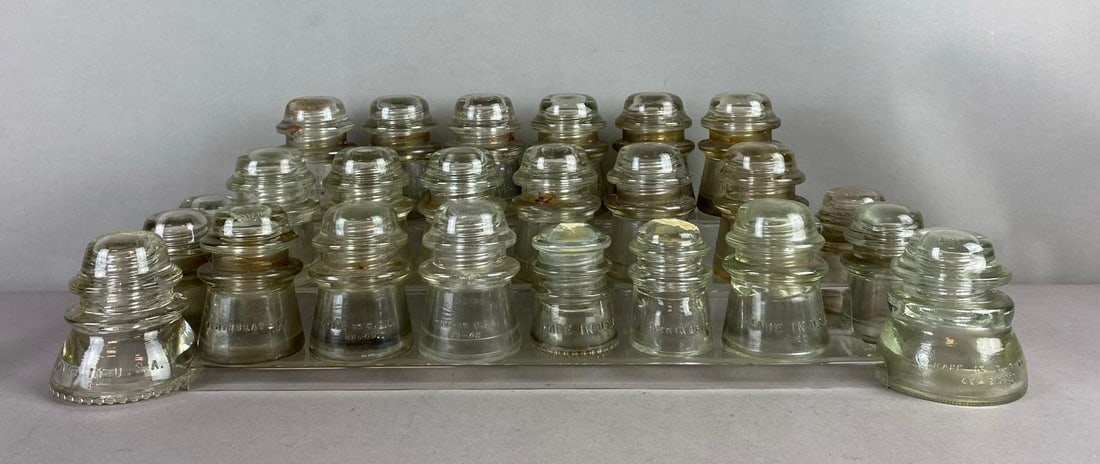 Group of Assorted Vintage Hemingray Glass Insulators: Includes No.17, 37, and more. Largest measures 4 inches. Stand not included.