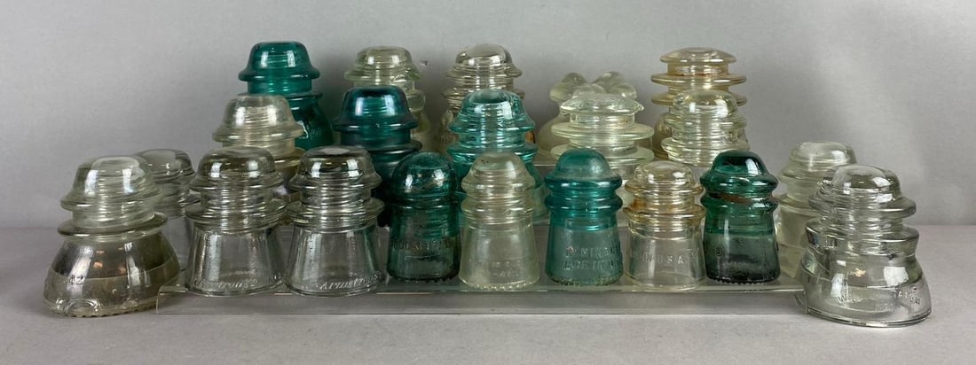 Group of Assorted Vintage Hemingray Glass Insulators and more: Includes Brookfield, Armstrong, and more. Largest measures 4 inches tall. Stand not included.