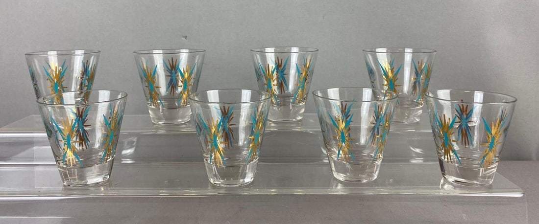 Group of 8 1950s Federal Glass Inca Shot Glasses: One measure 3 inches tall. Stand not included.