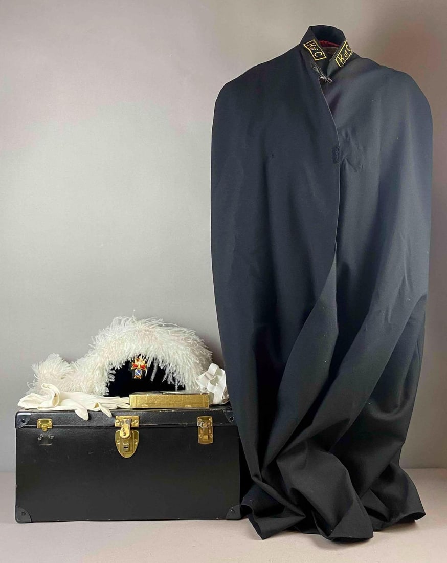 Knights of Columbus Fourth Degree Regalia: Includes Chapeau 7 1/8 size hat, ceremonial cap, and more. Comes in original box. Box has a latch missing. Mannequin not included.