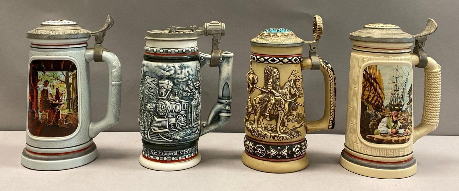 Group of 4 Avon Commemorative Relief Pottery Steins (1 of 4)