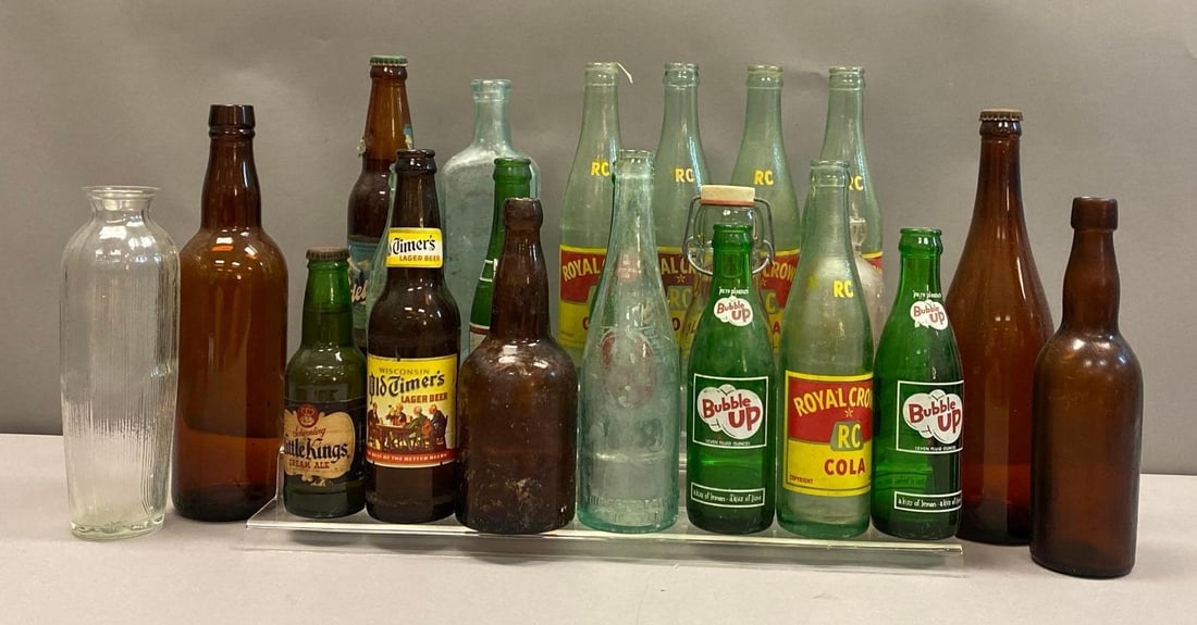 Group of Assorted Glass Advertising Bottles and More: Includes glass vase, bubble up soda, Royal crown soda, Old Timbers beer and more, tallest measures 11 1/2 inches H