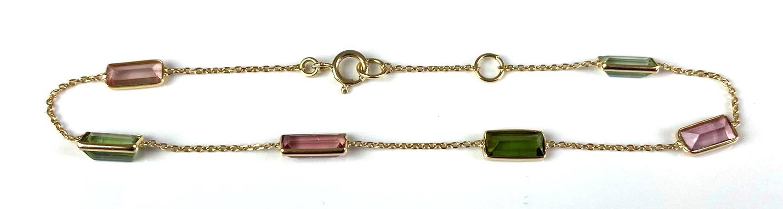 18K Yellow Gold Emerald Rose Quartz Bracelet: Total weight of 1.8 grams, measures 7 inches in length