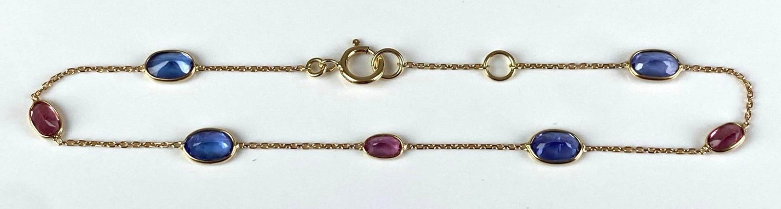 18K Yellow Gold Benitoite Rose Quartz Bracelet: Total weight of 1.5 grams, measures 7 inches in length
