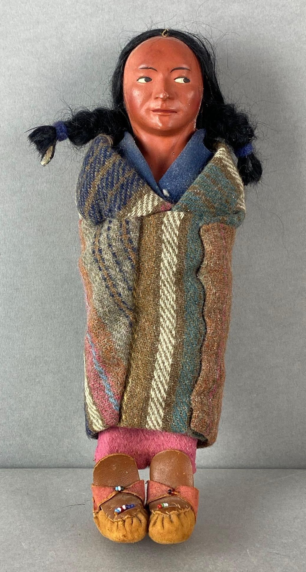 Skookum Native American Doll: Measures 11 inches tall.