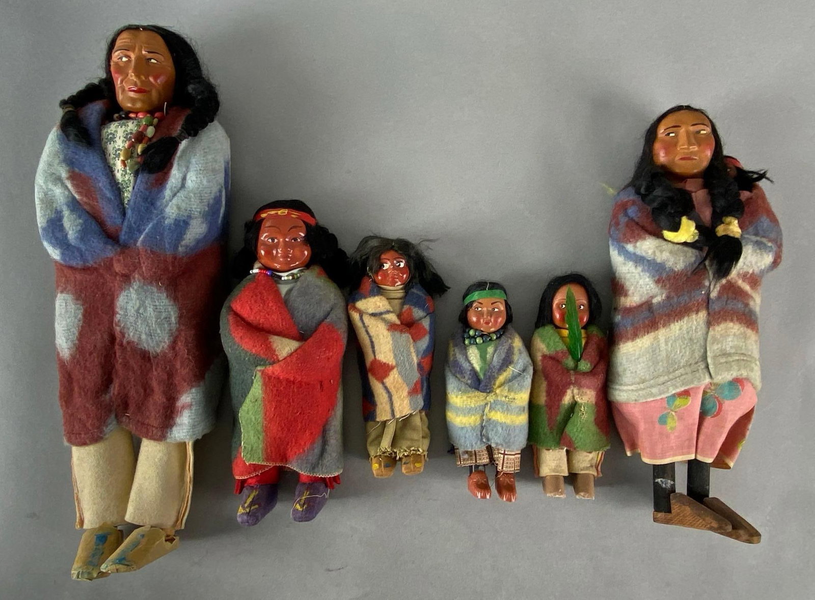 Group of 6 Skookum Native American Dolls: Largest measures 15 1/2 inches tall.