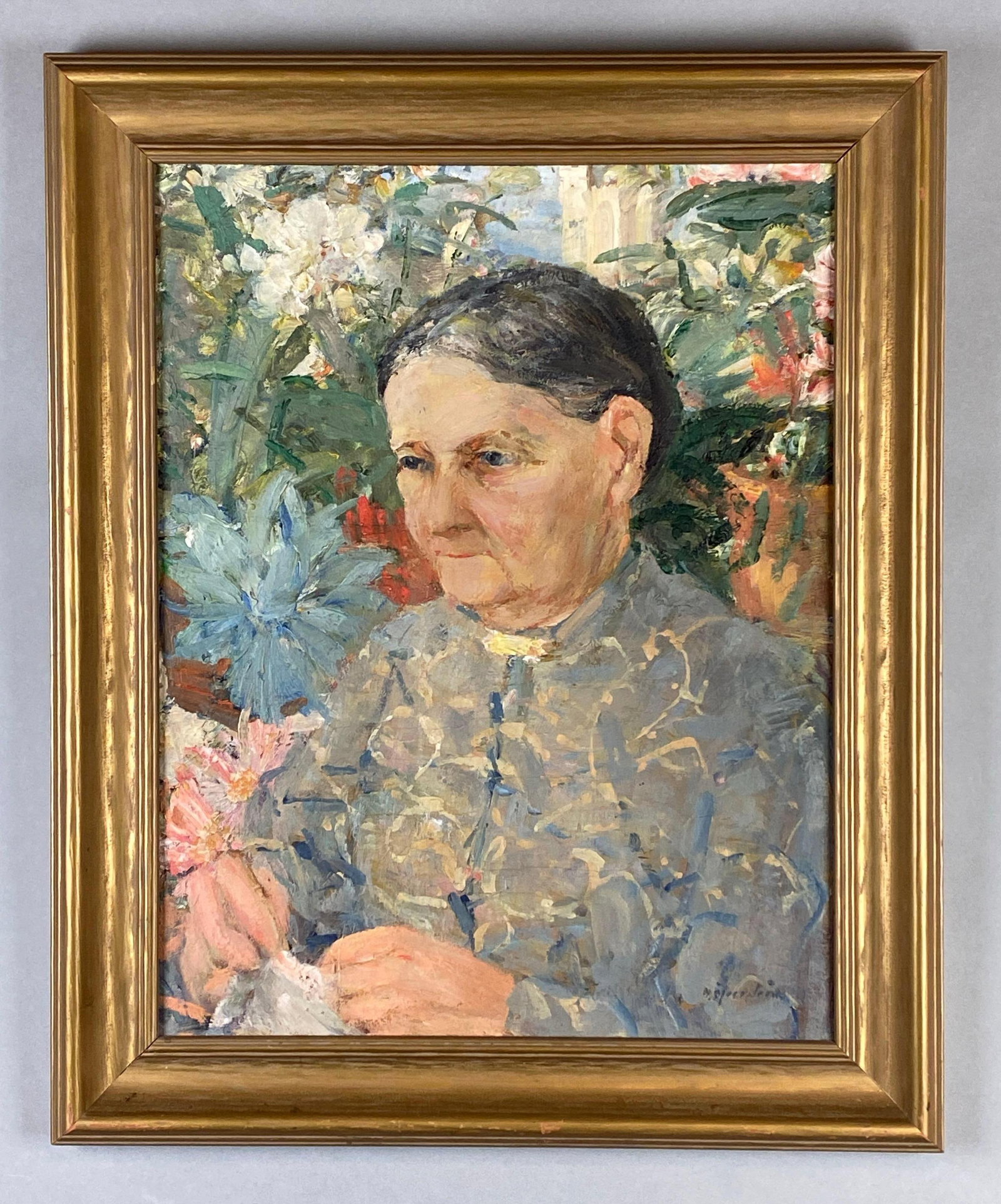 Elderly Woman in Flowers Oil Painting on Board: Artists signature on bottom right corner, Frame measures 26 x 21 1/2 inches, Board measures 21 1/2 x 16 1/2 inches.