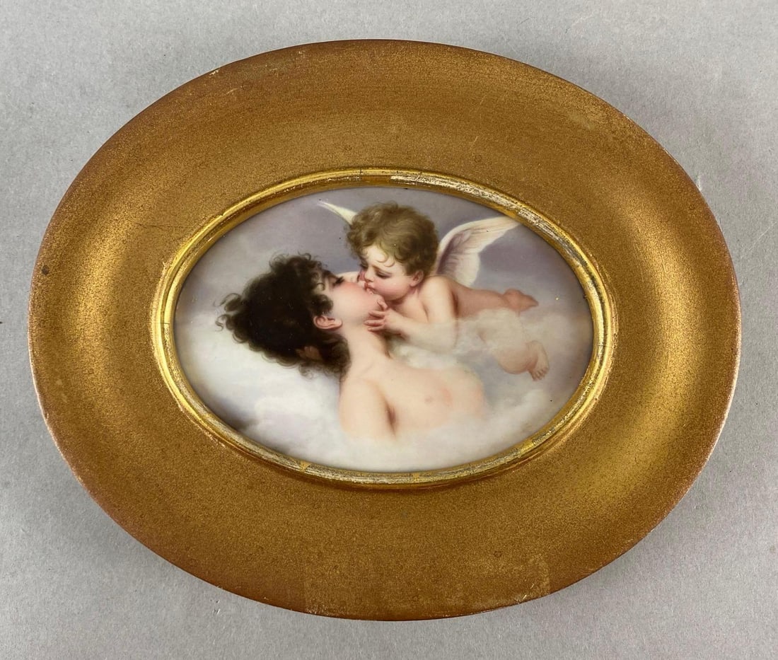 Vintage German Porcelain Cherub with Woman Painted Tile: Frame measures 6 1/4 x 7 3/4 x 1 inches.