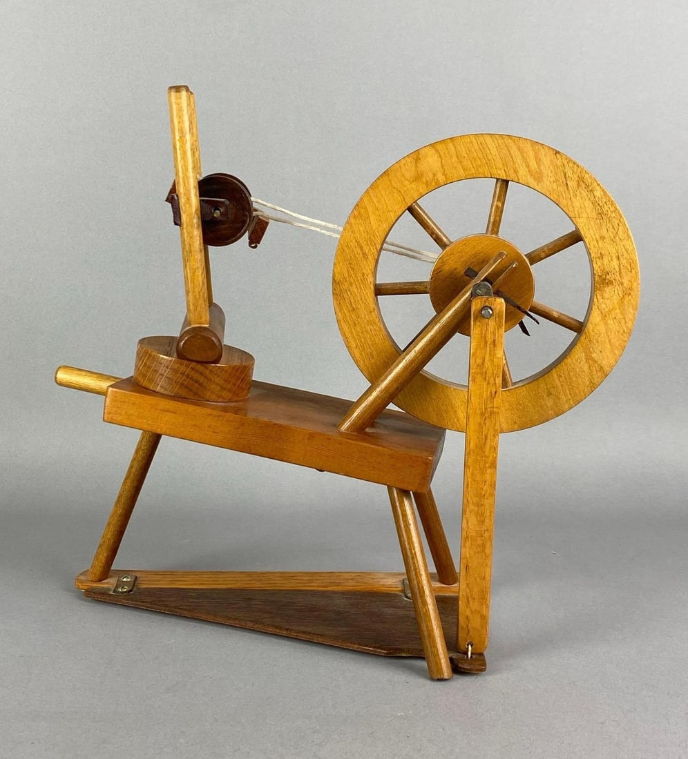Miniature Wood Spinning Wheel: Measures 11 inches H x 12 inches W x 5 inches D