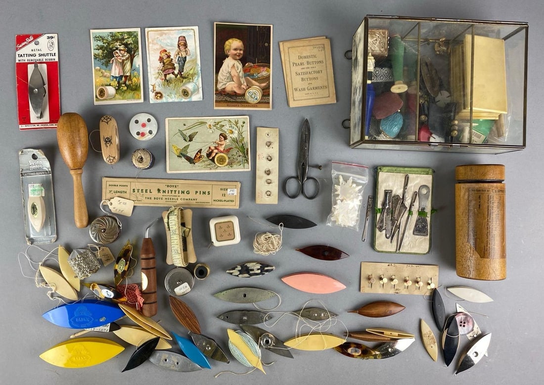 Group of Vintage Sewing Items and More: Includes tatting shuttles, trade cards, cufflinks and more, some sterling silver, Glass box measures 6 inches H x 8 inches W x 3 inches D