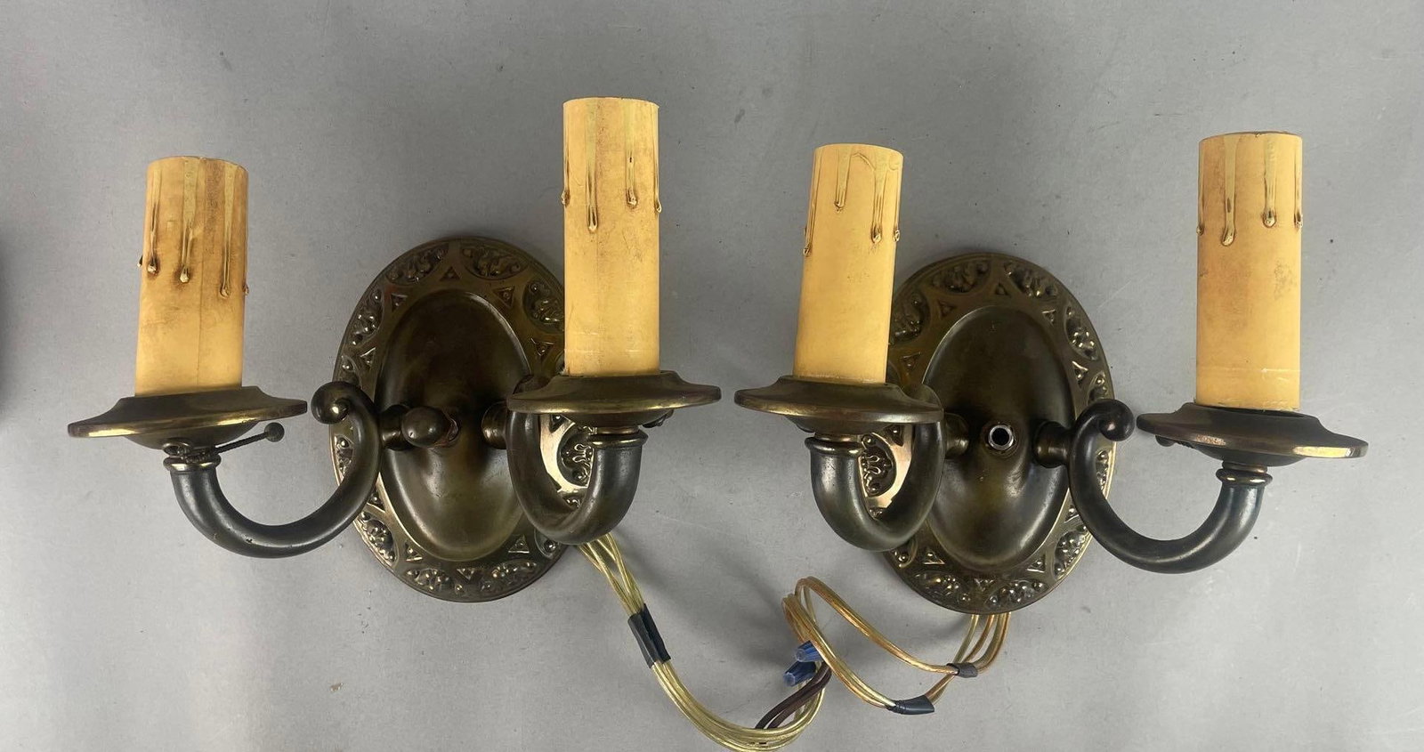 Pair of Antique Candelabra Electric Wall Sconces: Oval back plates, each measure 7 1/2" x 8 1/2" x 5 1/2"