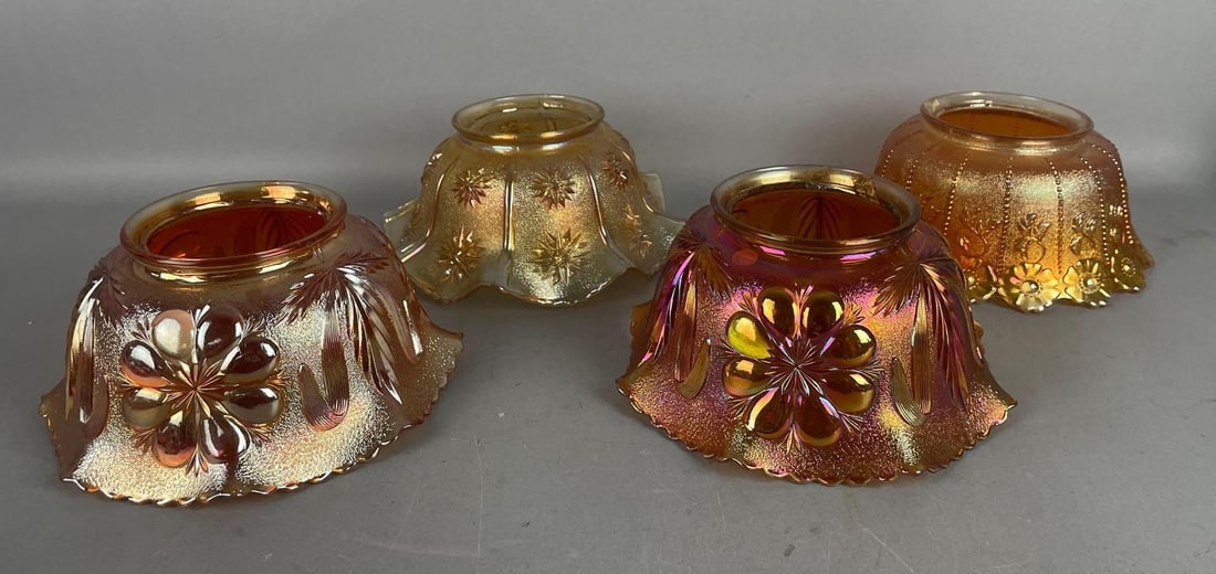 Group of Antique Marigold Carnival Glass Lamp Shades: Includes floral cut, star pattern, largest measures 3 3/4" x 8", 4" fitter