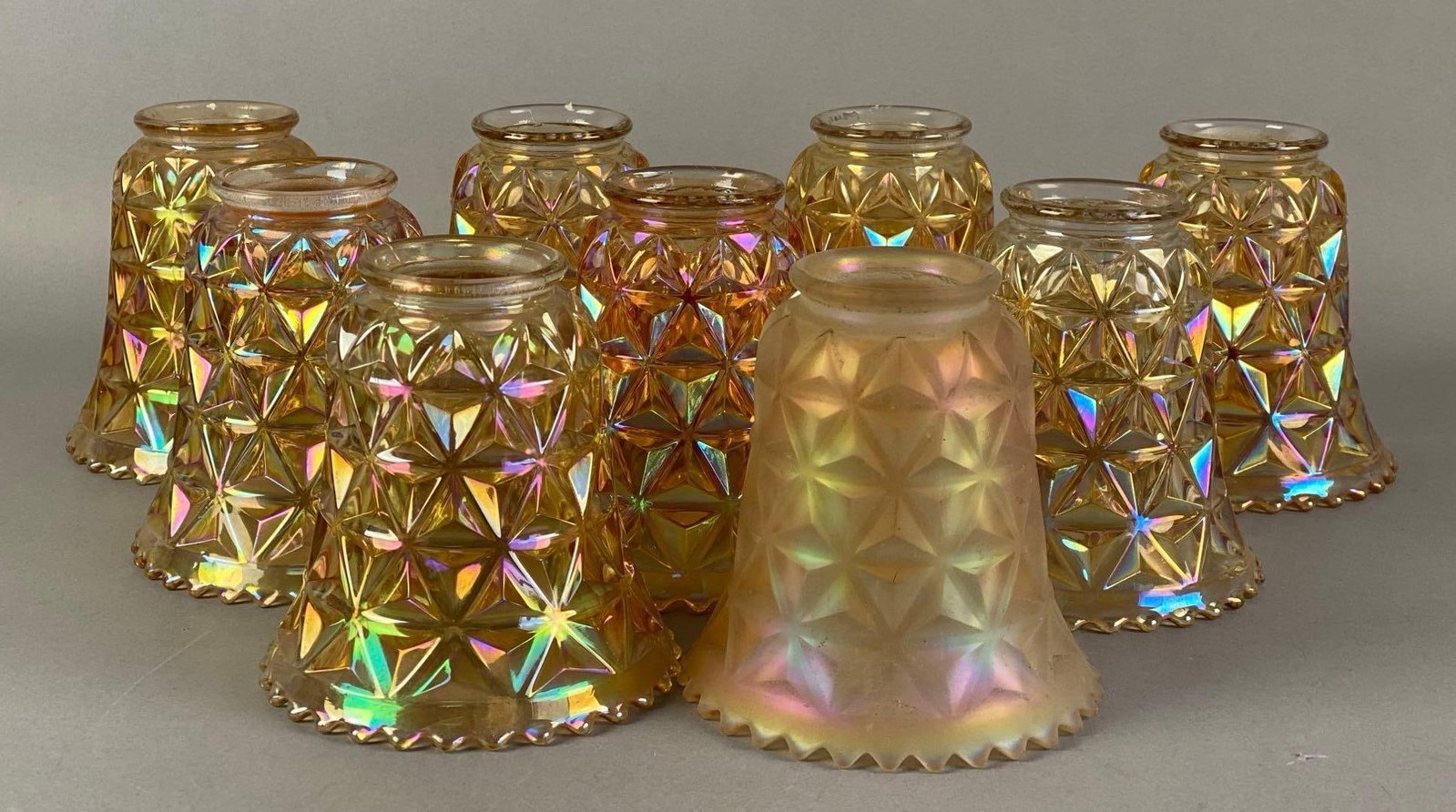 Group of 9 Antique Geometrical Gold Iridescent Art Glass Lamp Shades: Includes one frosted, largest measures 4 3/4 inches H x 4 1/2 inches W with a 2 1/2 inches fitter