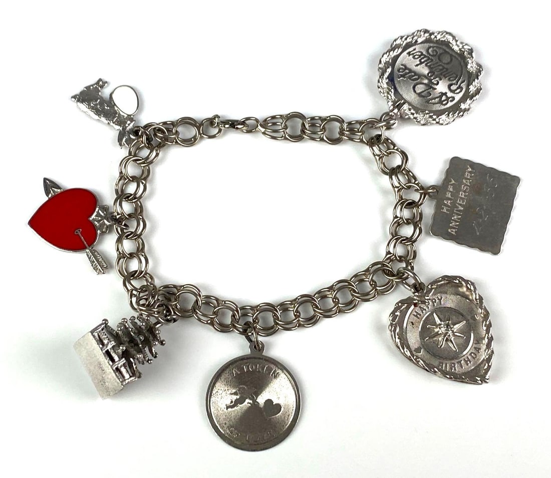 Sterling Silver Charm Bracelet: Measures 7 in length