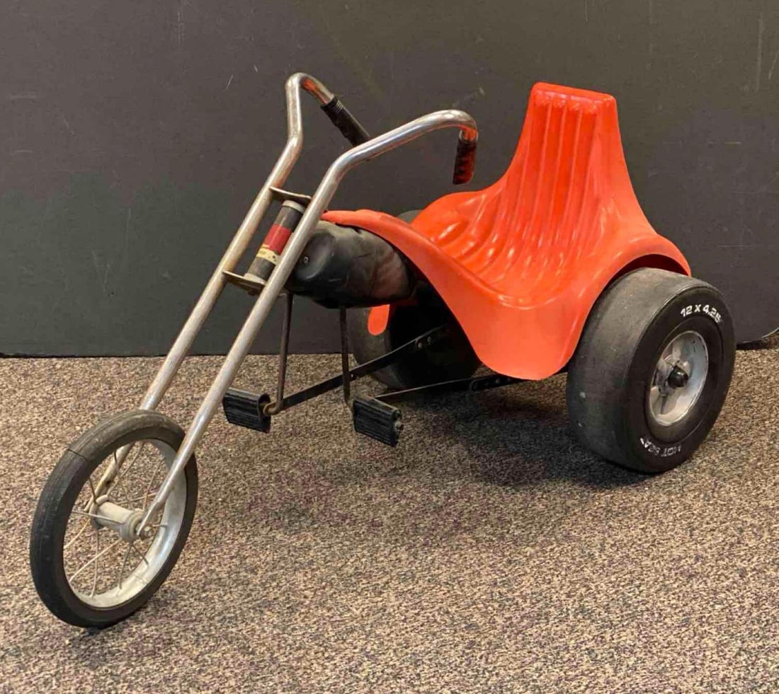 1970s AMF Junior Hot Seat Trike Chopper: NO IN HOUSE SHIPPING AVAILABLE, THIRD PARTY SHIPPING RECOMMENDED, includes spare wheel, needs cleaning, some rust and sticker wear, large crack in seat, measures 22 H x 24 W x 48 D