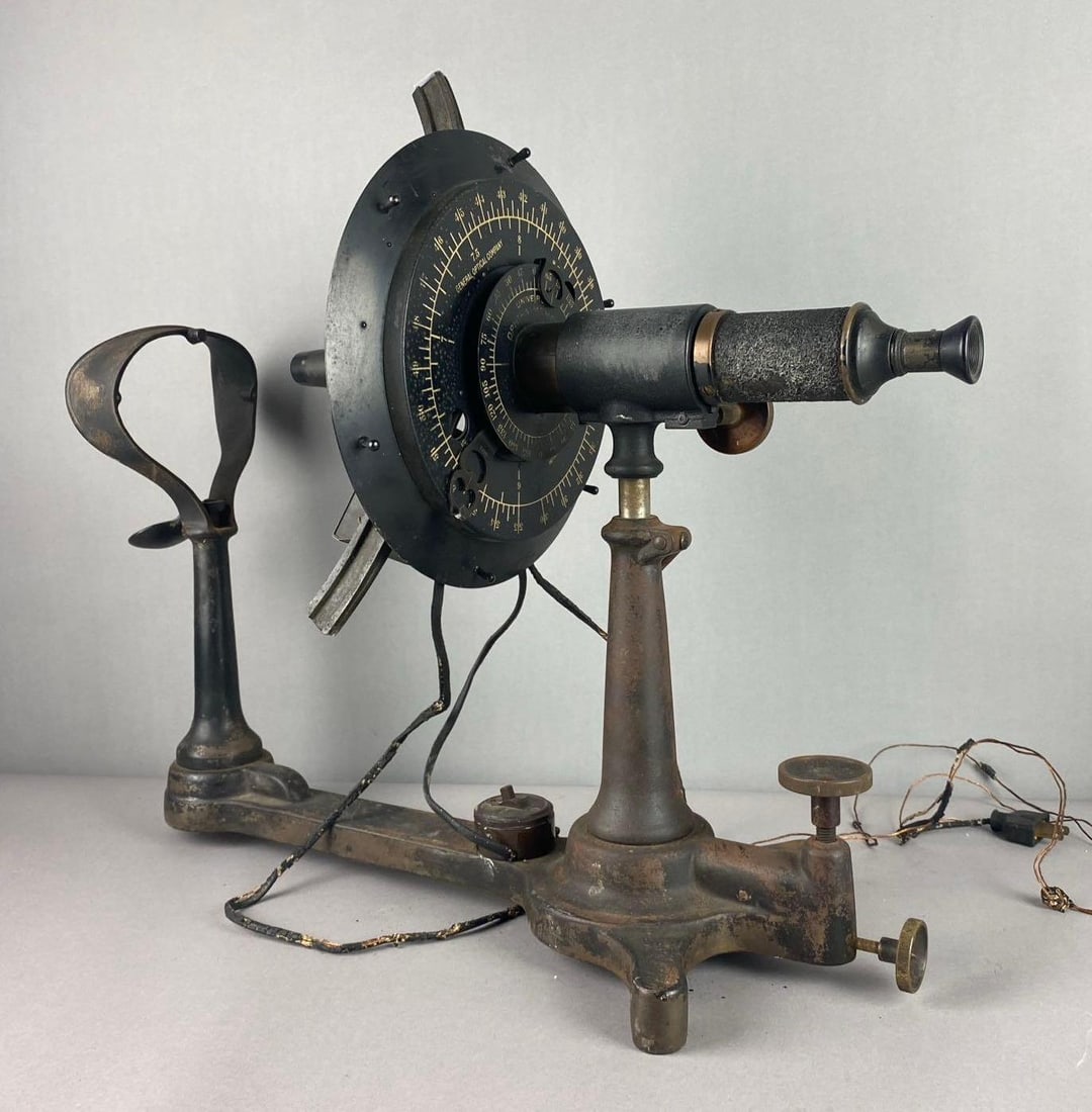 Antique 1910?s Cast Iron Universal Ophthalmometer: Mfg by General Optical Company. Untested. Will need rewiring. Measure H 22 x W 10 x L 22 inches.