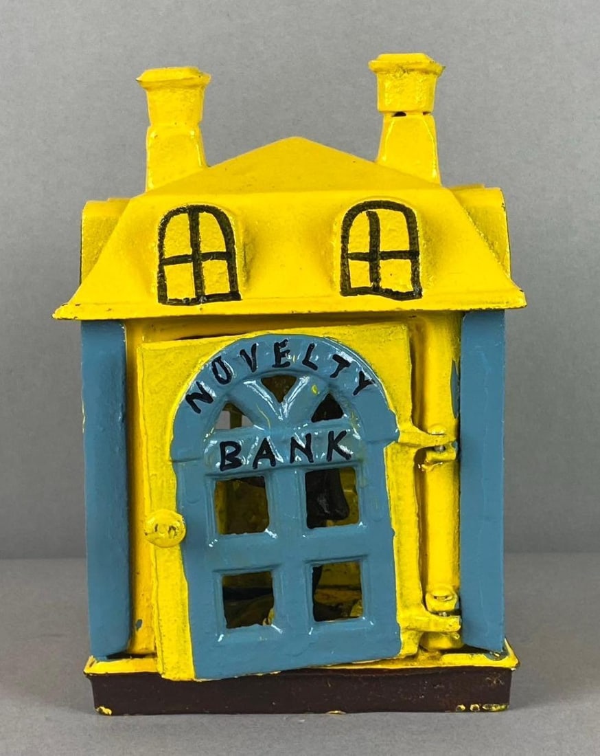 Vintage Novelty Bank Cast Iron Mechanical Coin Bank: measures H 6 x W 4 1/2 x L 5 inches.