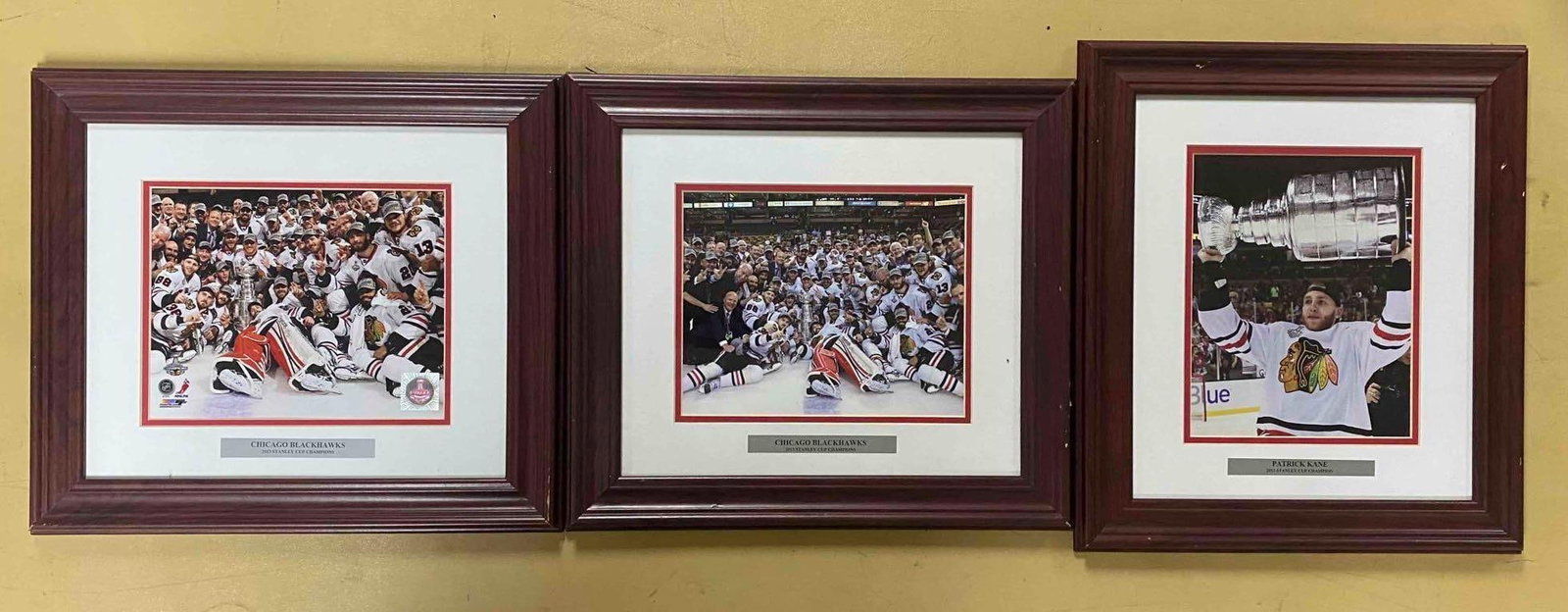 Group of 3 Framed 2013 Chicago Blackhawks Cup Champions Photographs: Largest measures L 17 x W 15 inches.