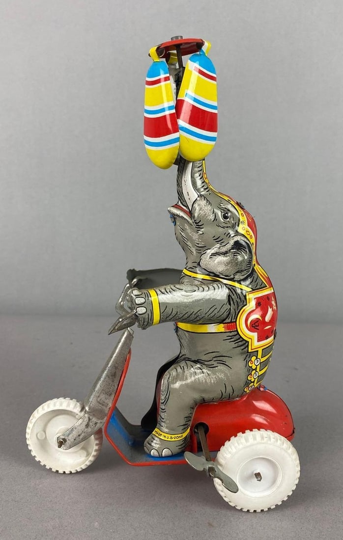 Vintage 1950?s U.S. Zone Germany Tin Litho Mechanical Wind-Up Circus Elephant Toy: Working Condition. Measure 8 tall.