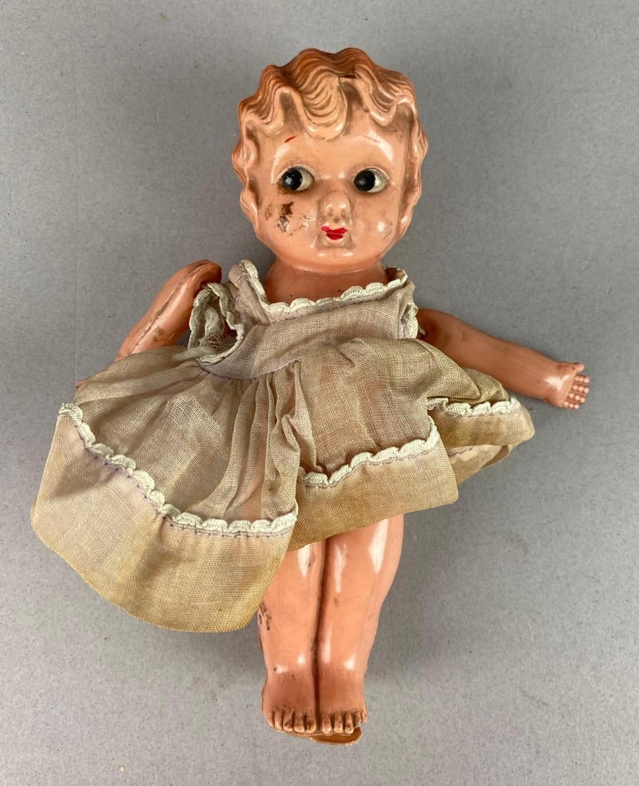Vintage 1950?s Japan Celluloid School Girl Figure: Has multiple cracks in plastic. Measures 6 tall.
