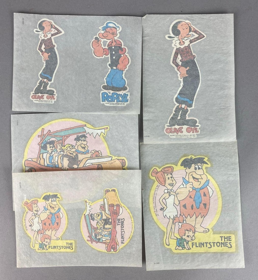 Group of Assorted Vintage 1976 Iron-On Flintstones Transfers and More: Includes 1976 Popeyes. Largest measures 6 tall.