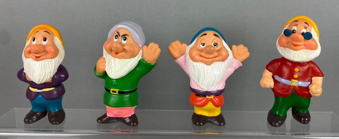 Group of 4 Walt Disney Snow White Dwarfs Squeaky Toys: Largest measures 5 in length. Made in China. Stand not included.