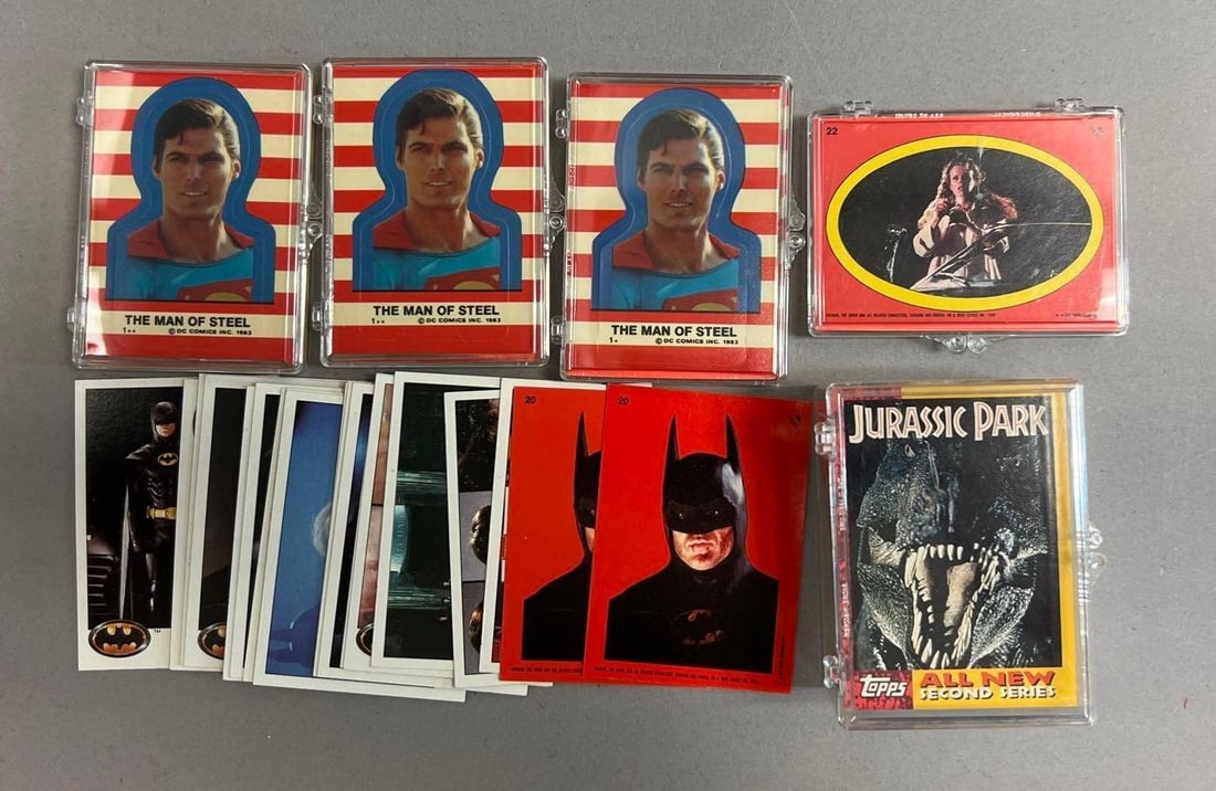 Vintage Movie and Trading Card Lot w/ Superman, Batman, Star Wars and Jurassic Park: Assorted vintage movie trading cards including Superman III, Batman, Star Wars, and Jurassic Park. Includes loose cards and card sets in protective cases. Please see photos for condition and included 