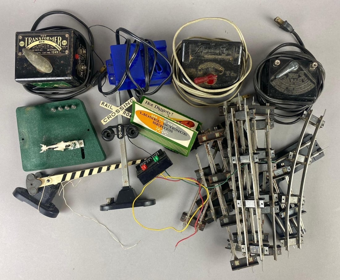 Group of Assorted Vintage 1950?s American Flyer Transformers and More: Includes 5 o Guage tracks, railroad crossings guards, and more. Untested.