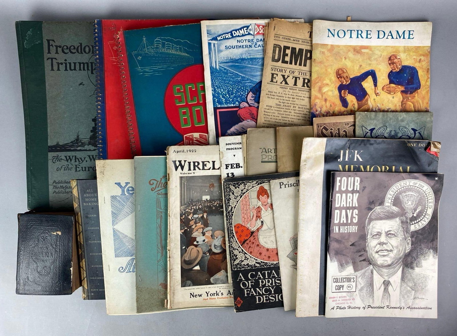 Group of Assorted Vintage Ephemera: Includes 1886 German Bible, The Yellow and Blue, notre dame program and more, largest measures 14 H x 11 W