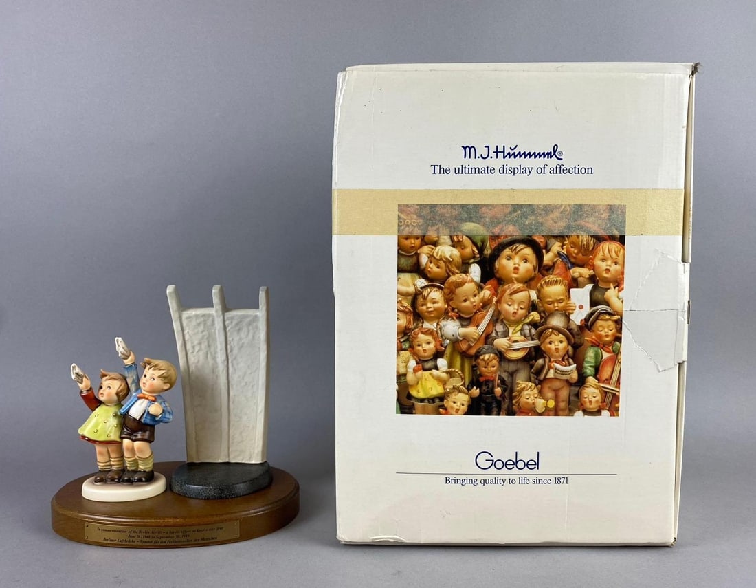 1993 M.J. Hummel Airlift Memorial Porcelain Display: Like new in original packaging. Measure 8 tall.