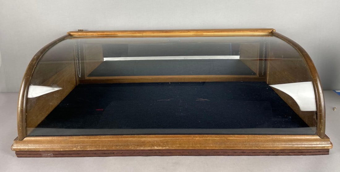 Antique Curved Glass Display Case with Mirrored Back: No in-house shipping available, 3rd party shipper or pickup. Measures 10 1/2 inches x 32 inches x 16 1/2 inches