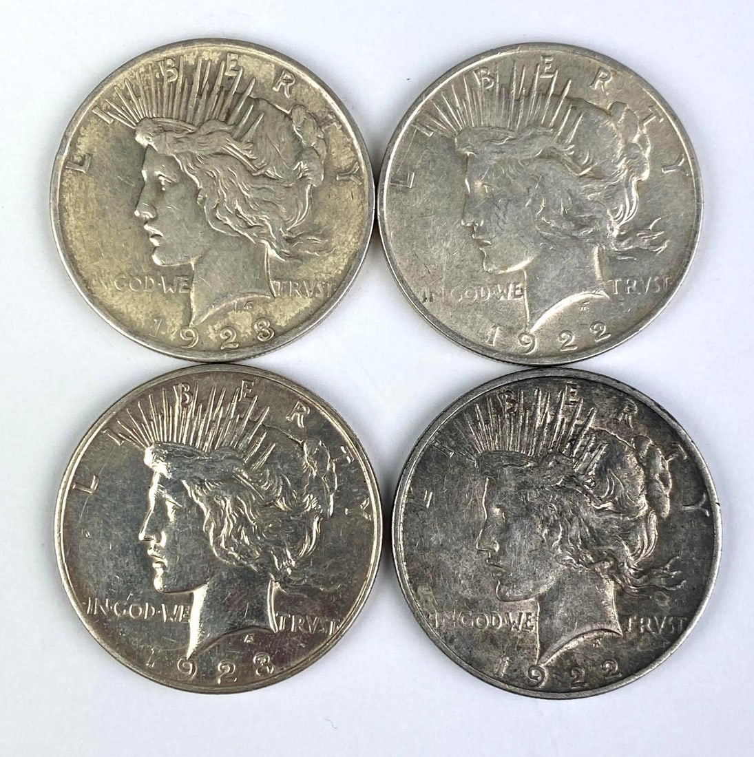 Group of 4 1922/1923 US Silver Peace Dollars: Group of 4 1922/1923 US Silver Peace Dollars