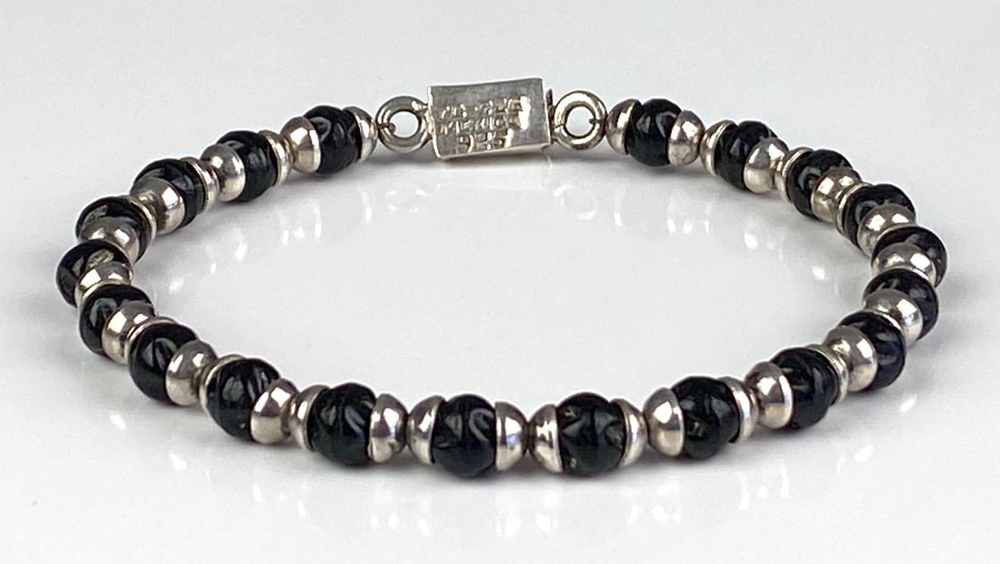 Mexican Sterling Silver Carved Onyx Bead Bracelet: Measures 8 inches in length