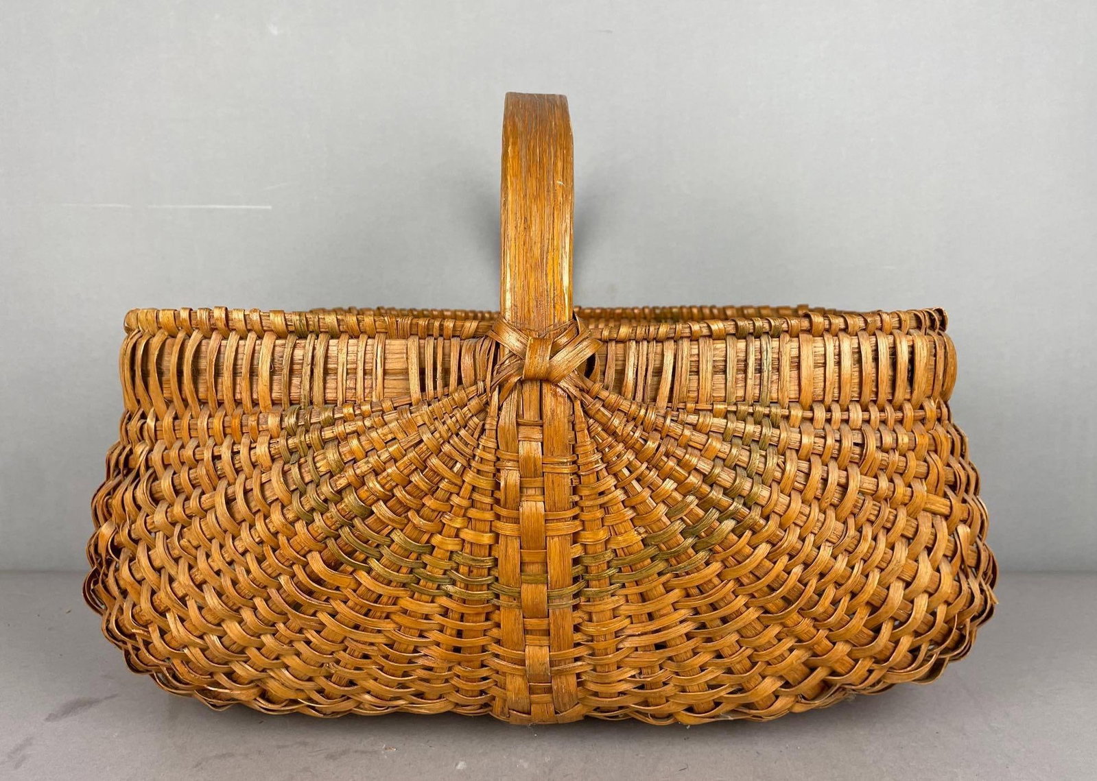 Vintage Wicker Buttocks Basket: Measures 13 inches x 18 1/2 inches x 13 inches