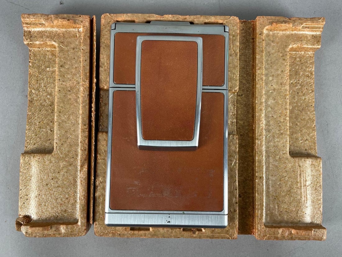 Vintage Polaroid SX-70 Land Camera: Original foam measures 8 inches x 5 inches x 2 1/2 inches