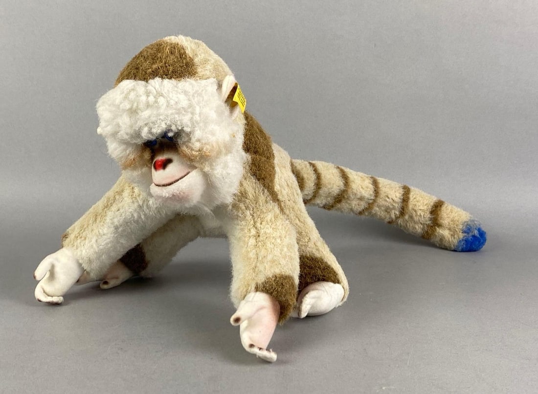 Steiff Mungo Monkey Stuffed Toy: made in germany, original tags, measures 8 inches H x 8 inches W x 18 inches D