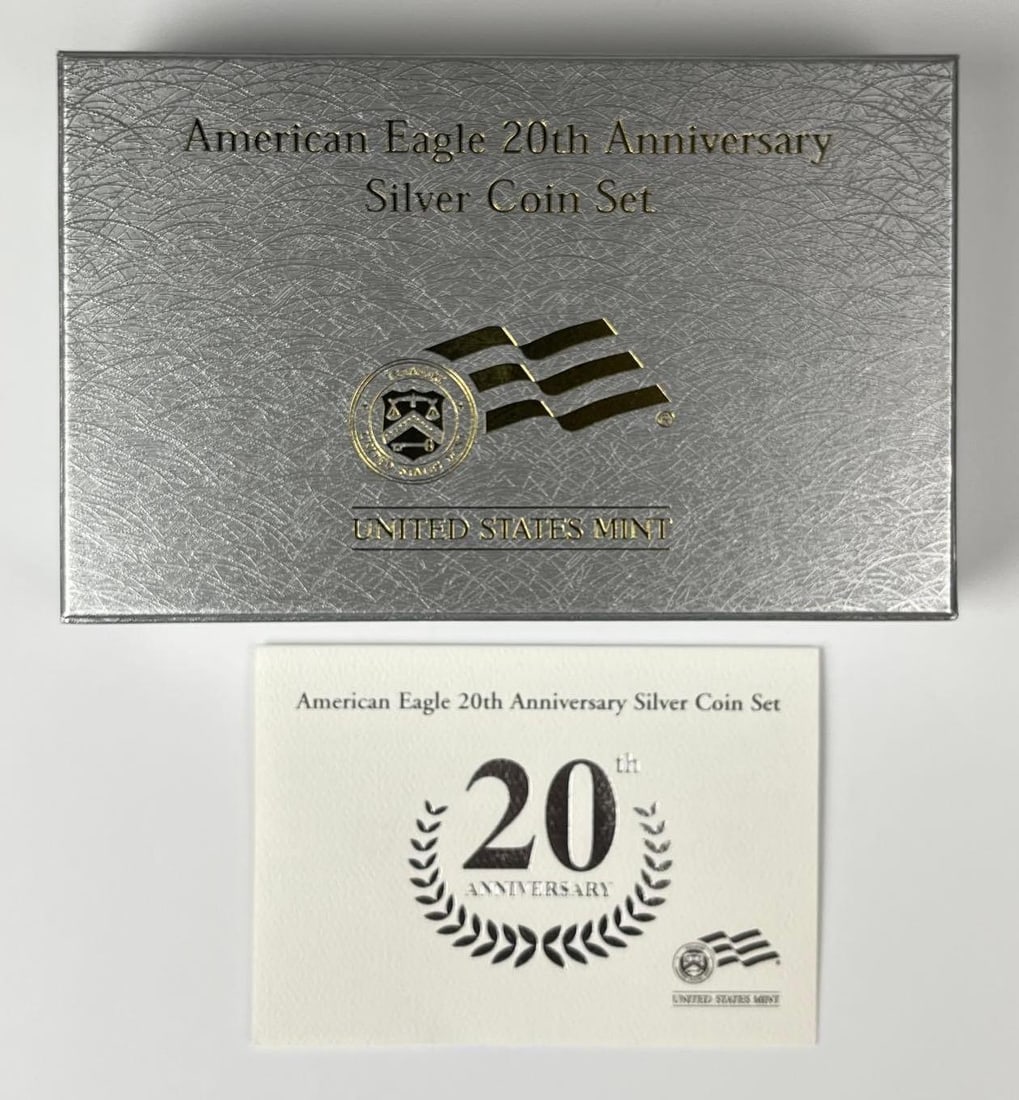 US Mint Eagle 20th Anniversary Silver 3 Coin Set: Includes COA. Features 3 2005 US $1 American Silver Eagle 1 oz Fine Silver Coins. 2 W one P.