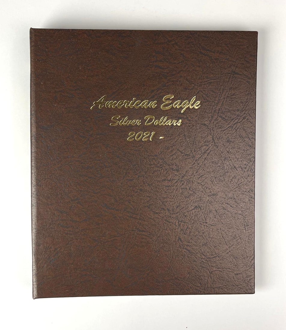 Group of 6 US $1 American Silver Eagle 1 oz Fine Silver Coins in a Dansco Album: Includes years 2021-2026.
