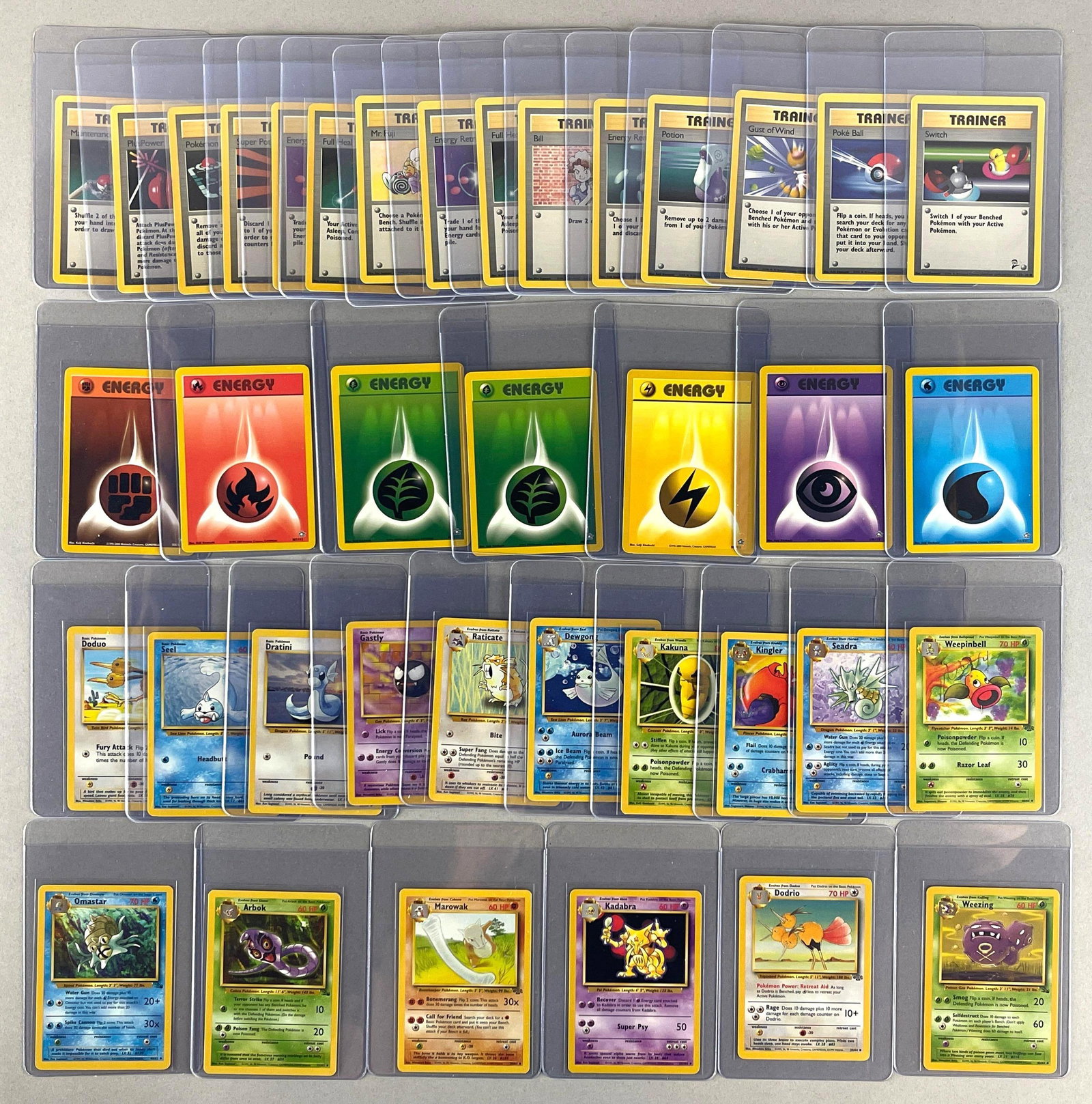 38 - 1999 and 2000 Pokemon Game, Fossil, Jungle, and Other Cards: Some Ready to Grade, 3 - Jungle, 7 - Fossil, 7 - Neo Genesis, 13 - Game, and 8 - Base set 2
