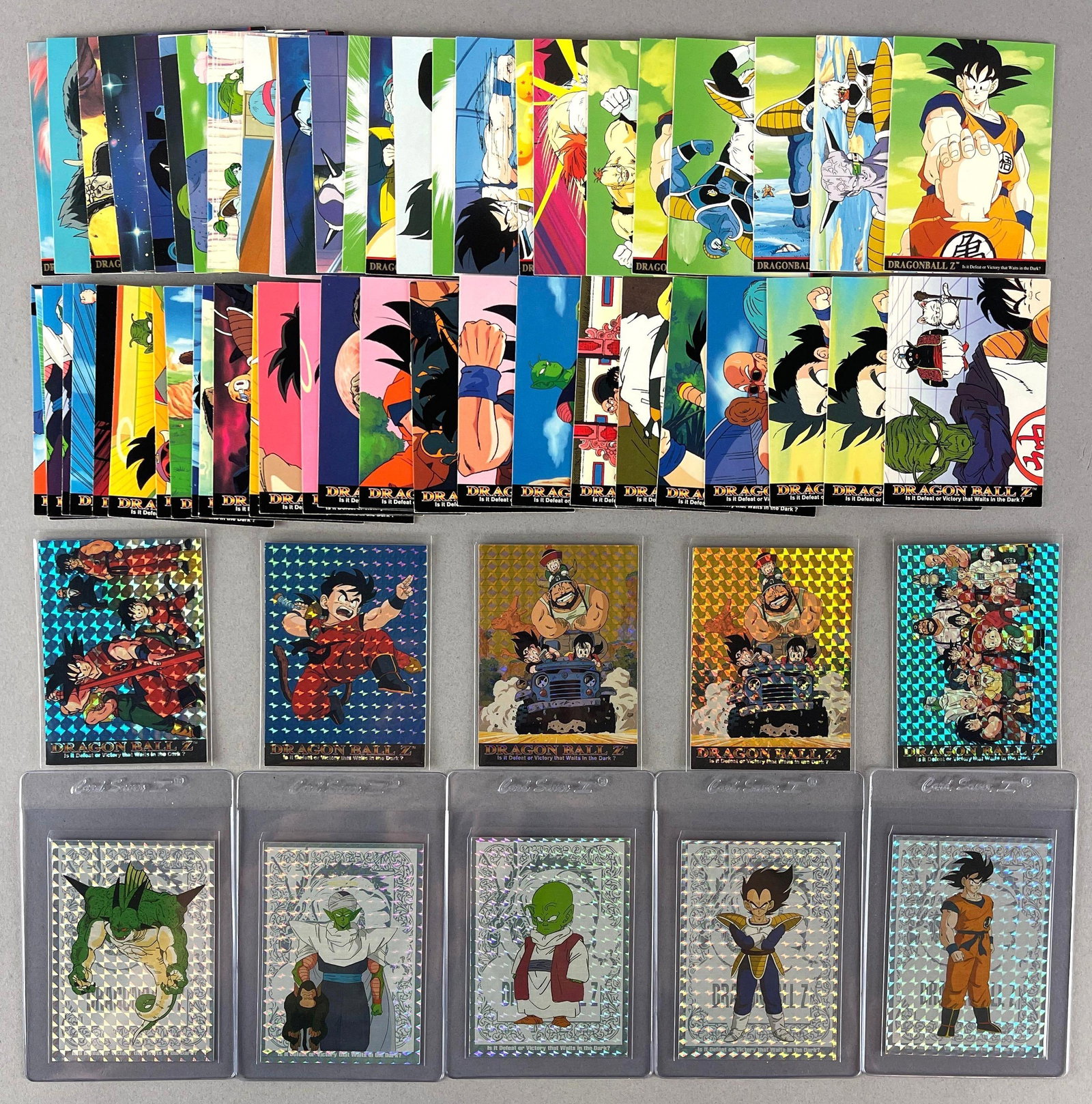 64 - 1996 and 98 Dragon Ball Z Cards with High Grade Prism Cards (1 of 2)