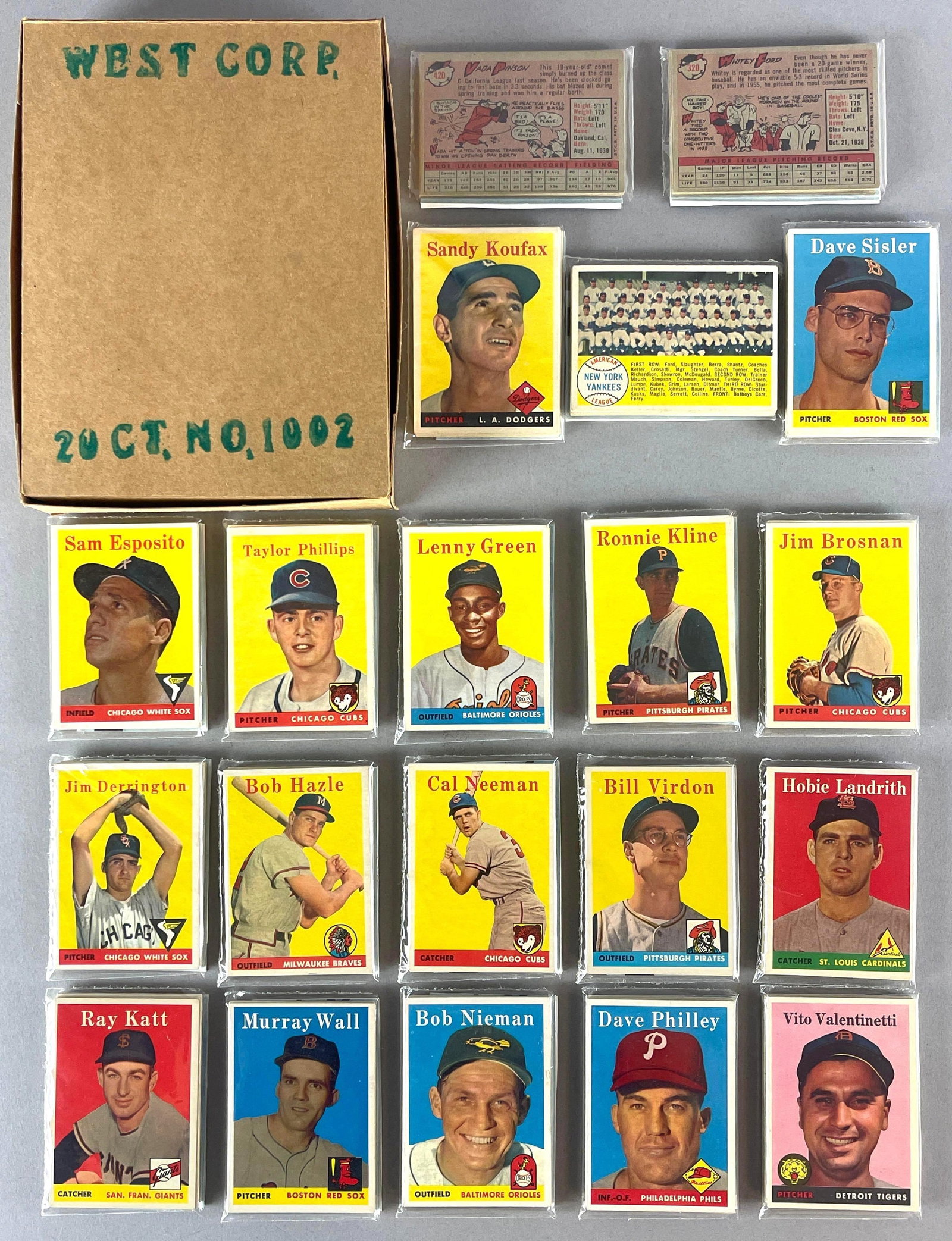 1958 Topps Baseball Cello Fun Pack Vender Box of 20 Packs, Koufax, Ford, Pinson Rookie Showing: Includes Sandy Koufax, Whitey Ford, Yankees Team Card, and Vada Pinson Rookie, 10 - Cards per pack, West Corps. was a repacking company in the 1970s