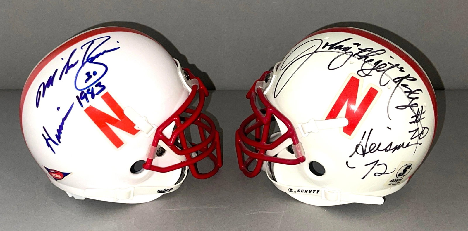 Nebraska Heisman Trophy Winners Johnny Rogers and Mike Rozier Signed Mini Helmets: Autographed Mike Rozier #30 Heisman 1983, Johnny The Jet Rodges #20 Heisman 72, We guarantee these to pass a 3rd party authentication