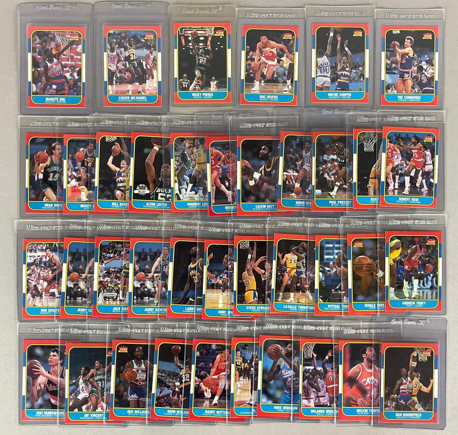 38 - 1986 Fleer Basketball Cards with Stars and Rookies: Conditions vary, EXMT - NMMT, Sharp cards, Includes Manute Bol #12 Rookie, Xavier McDaniel, Rickey Pierce, Doc Rivers, and More