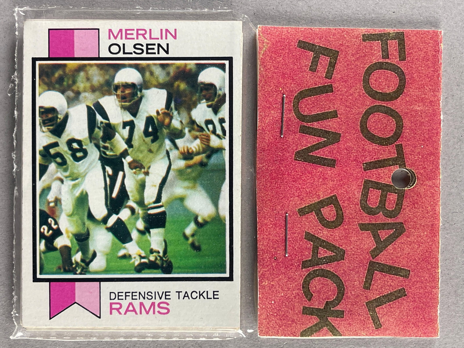 1973 Topps Football West Corps Cello Fun Pack with Merlin Olsen on Top: 10 - Cards per pack, West Corps. was a repacking company in the 1970s