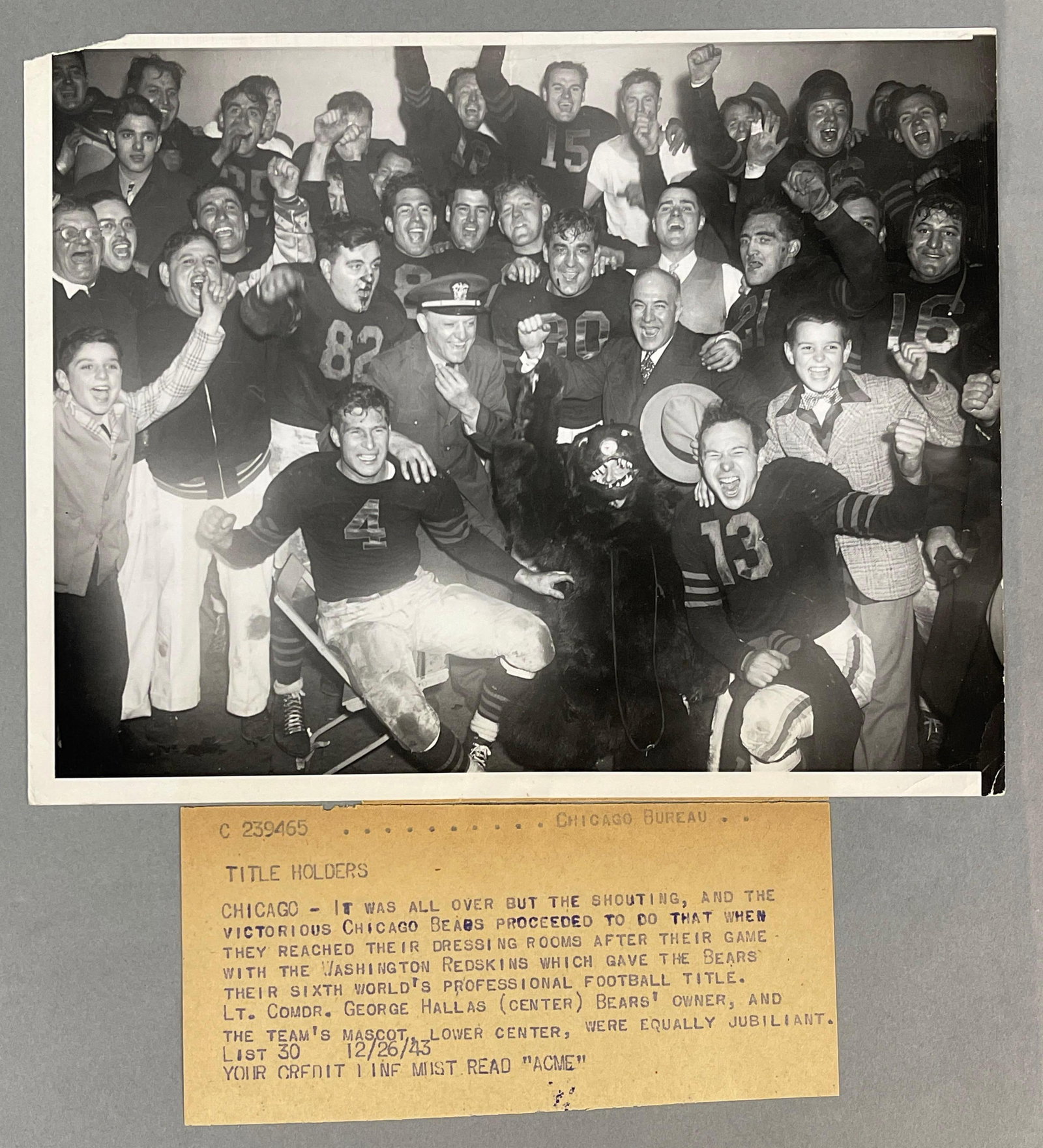 1943 Chicago Bears World Champions Original Photo: 1943 World Championship Winners, an original vintage 1943 Acme Newspictures Photo of the Chicago Bears after defeating the Washington Red Skins, Includes HOFs Sid Luckman, Bronko Nagurski, and Papa