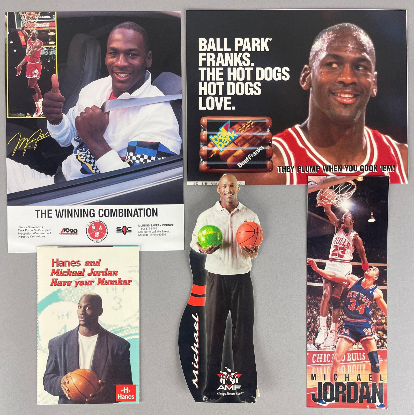 Late 80s - Early 90s Michael Jordan Advertising Pieces: Late 80s Costcos Brothers sports mailer, 1990s AMF Bowling standee, 1993 Ball Park Hot Dogs ad, Late 80s Winning Combination Illinois Safety Council Ad, 1995 Hanes ad, Largest measures 9 x 11 inches