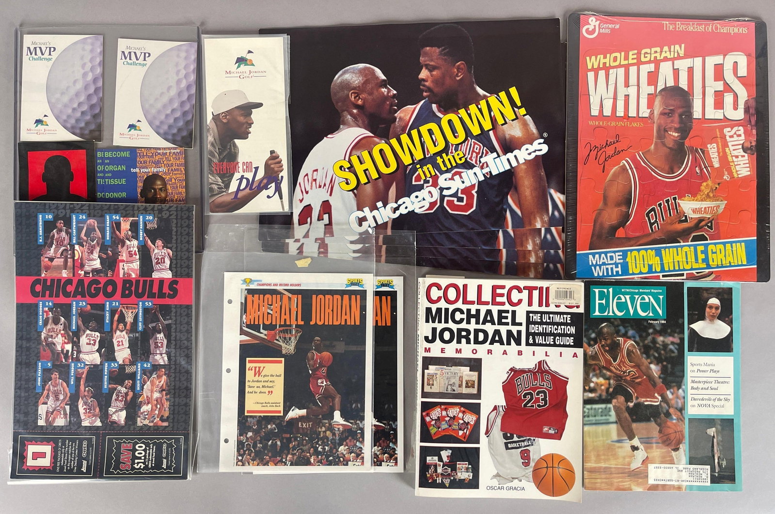 Collecting Michael Jordan Memorabilia Book, Photo Ads, and Puzzle: Michael Jordan Cologne, Organ Tissue, Golf Ads, 2 - 1991 Sports pages, 1992 Jewel and Oreo Bulls Ad, 4 - Sun-Times inserts