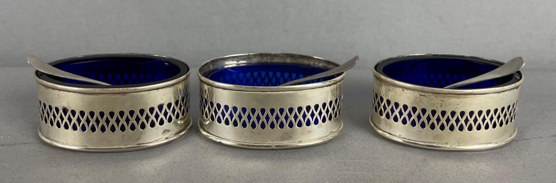 Group of 3 Vintage Sterling Silver and Cobalt Glass Footed Salt Cellars: Includes 3 sterling spoons, each measure 1 inches x 2 1/4 inches x 1 1/2 inches