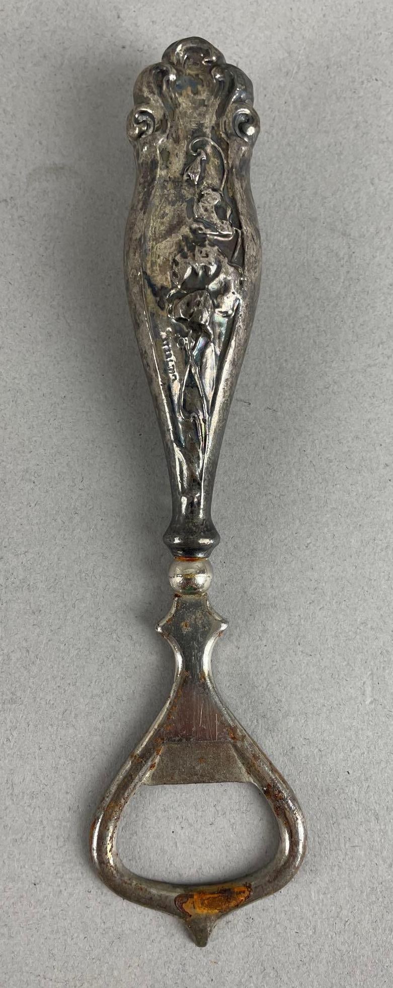 Vintage Sterling Silver Handle Bottle Opener: Stainless steel runs full length, measures 6 inches