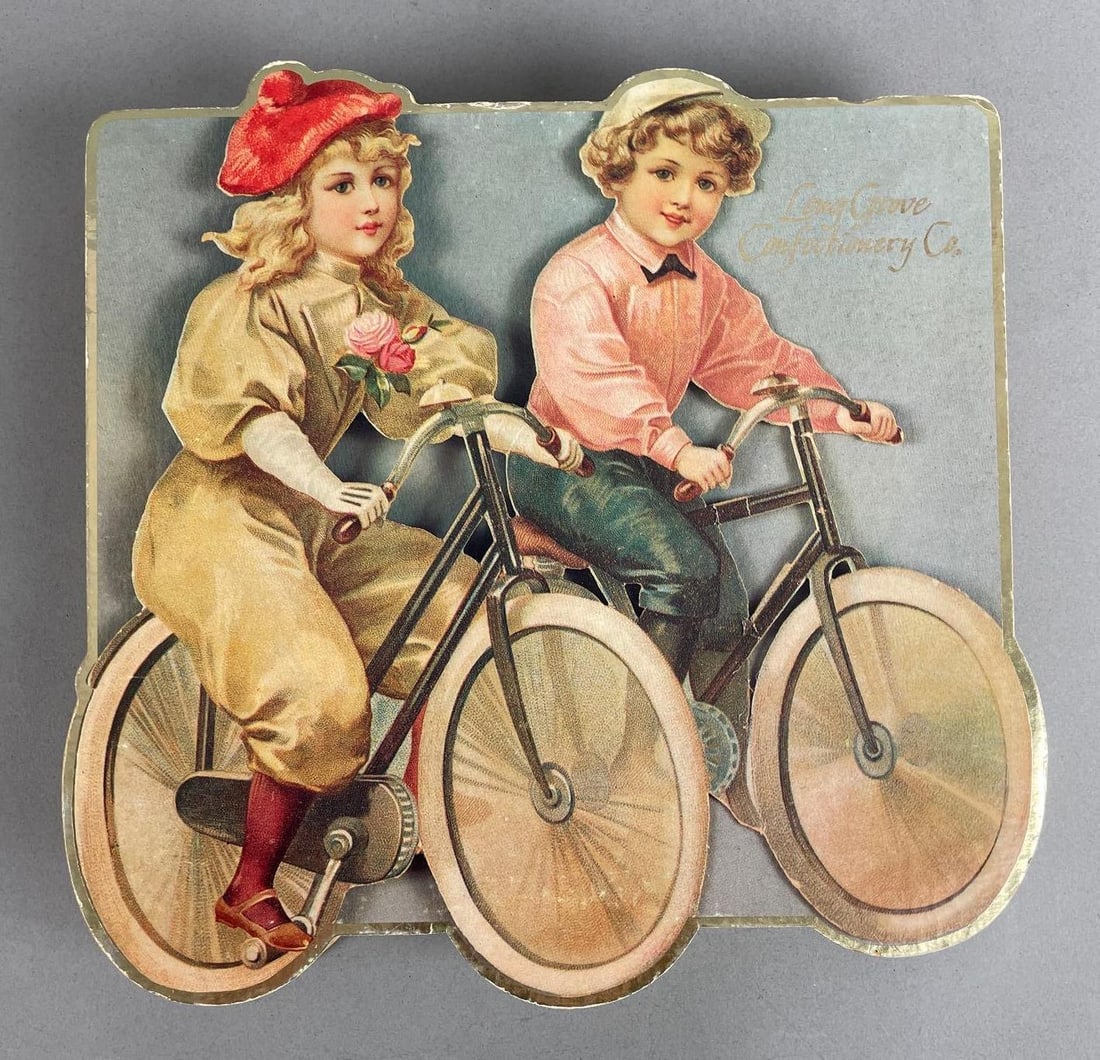 Vintage Long Grove Confectionery Co. Chocolate Box: Children on bicycles, measures 10 inches x 10 inches x 1 1/2 inches
